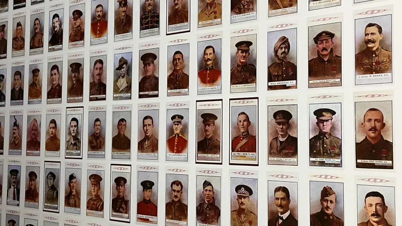 A wall showing images of famous masons