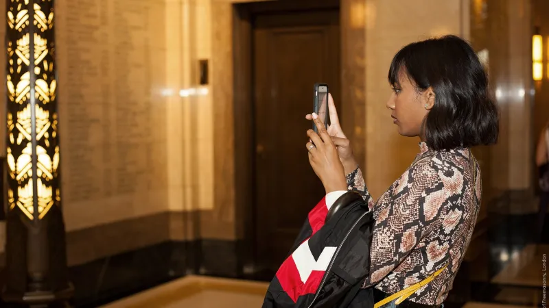 A woman doing the tour at Freemasons' Hall