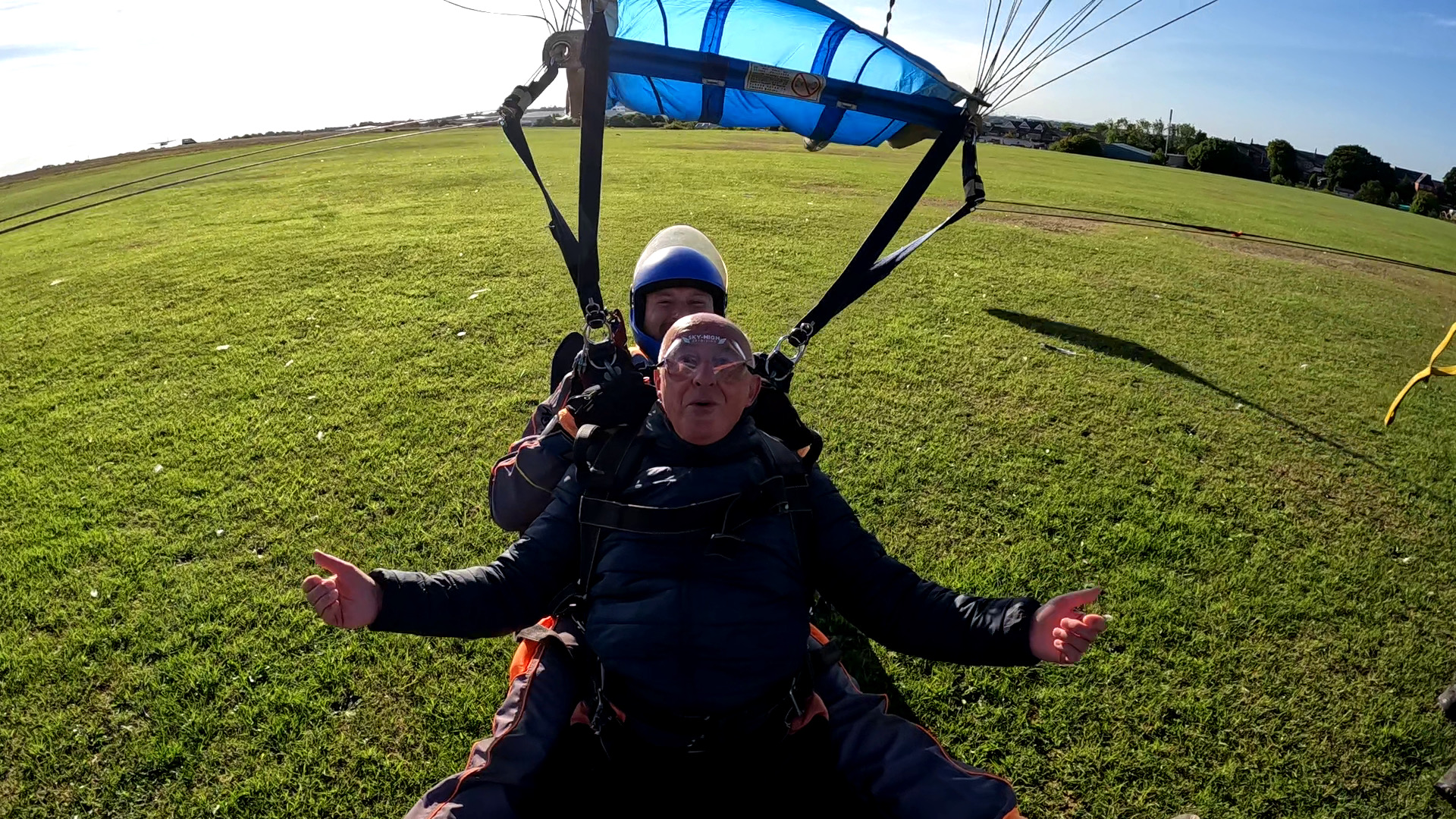 Freemason David Armstrong lands after flying with a parachute