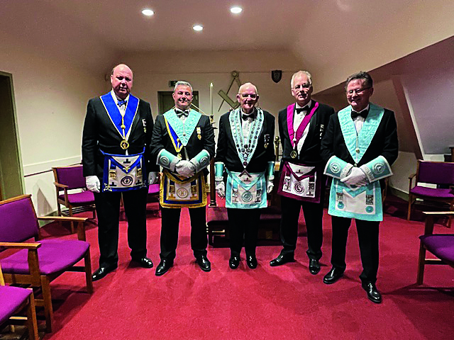 Suffolk Freemason pictured in a Lodge room wearing masonic regalia