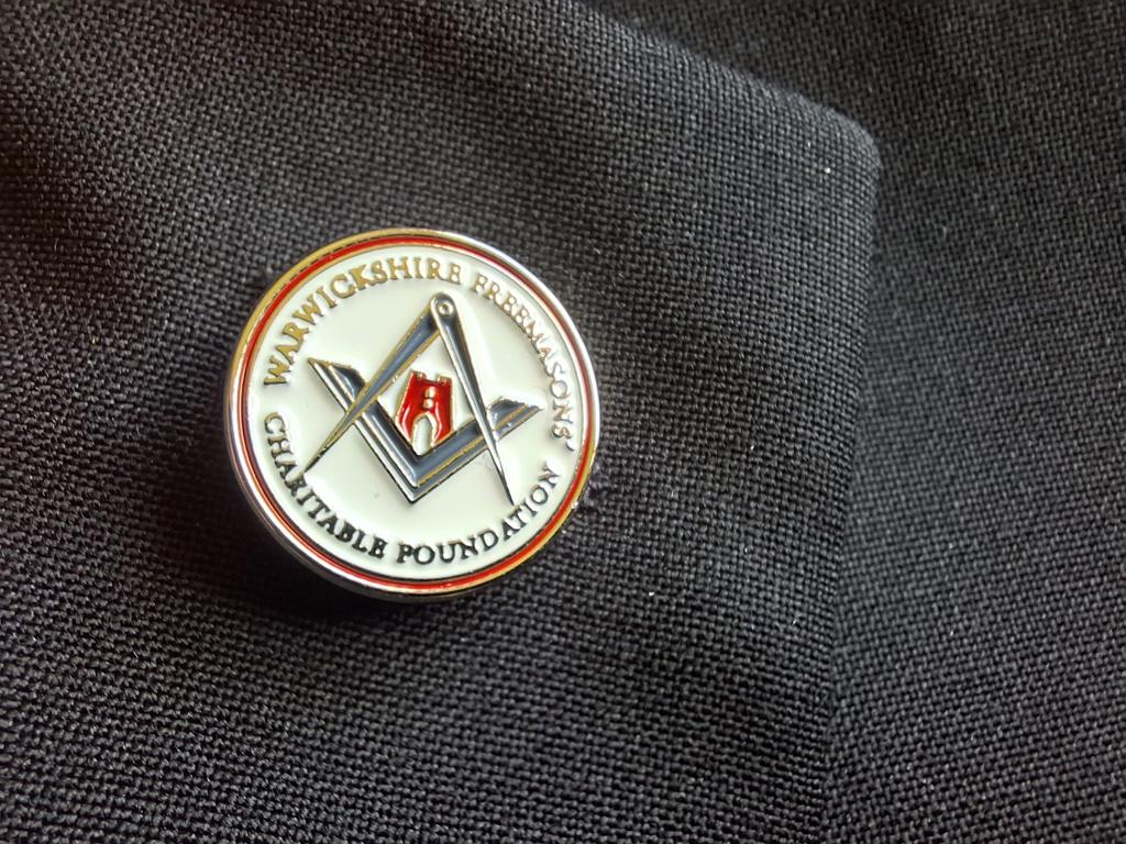 Warwickshire Freemasons sold lapel pins to raise £900 for charity