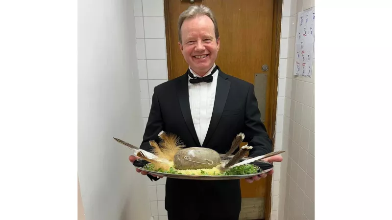 David Arrow brings in the haggis.