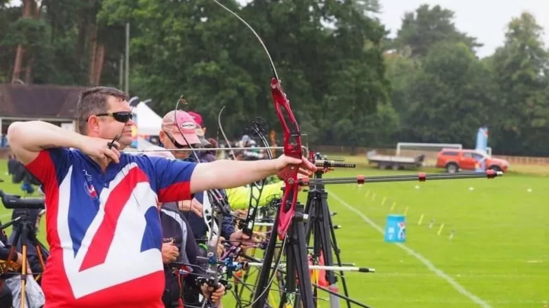 Clive, a blind Shropshire Freemason, competing in an archery competition. 