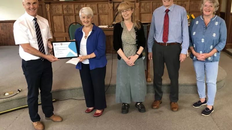 Freemasons presenting a cheque to Dementia Friendly Parishes