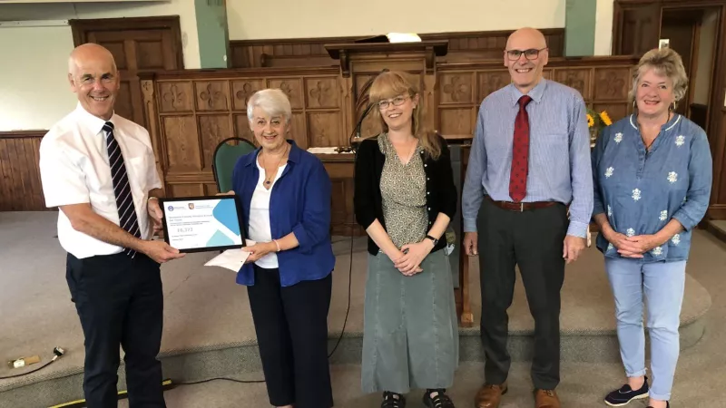 Devonshire Freemasons presenting a cheque to Dementia Friendly Parishes