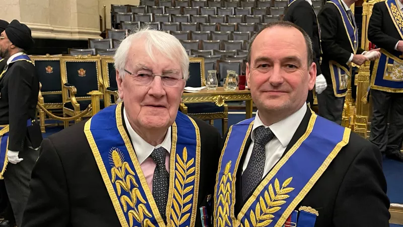 Walter and Simon Yule wearing Masonic Regalia in the Grand Temple of Freemasons Hall