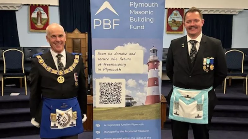 The photograph shows R W Bro Nicholas Ball alongside one of the Plymouth Building Fund Banners accompanied by W Bro Andrew Forward who is a member of the PBF Steering Committee. 